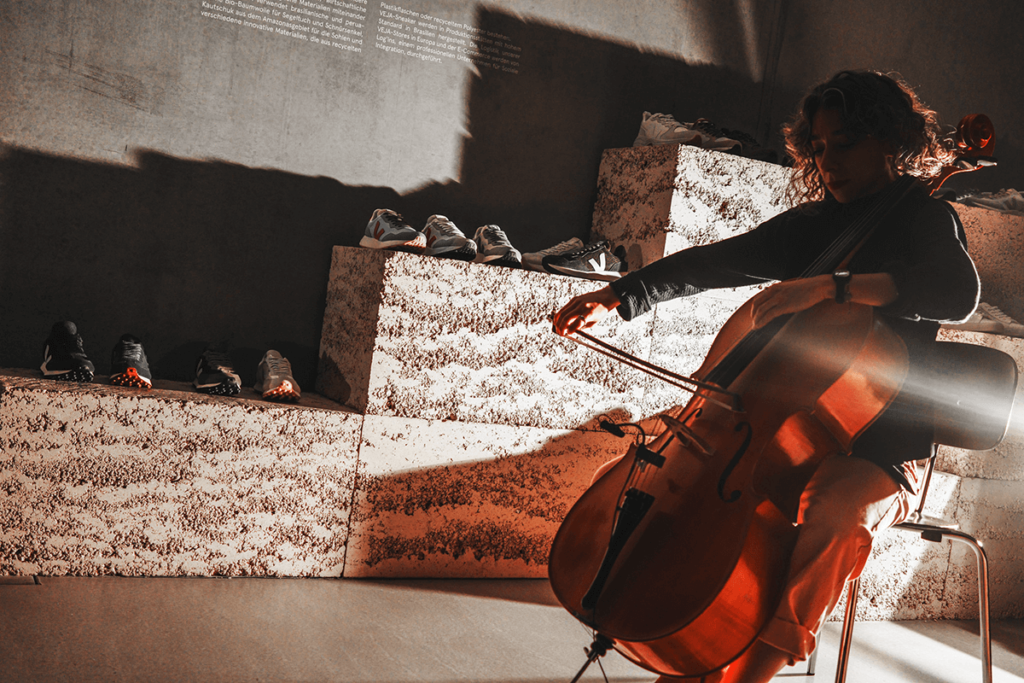 "Cellist Zeynep Ayşe Hatipoğlu fills the VEJA Store Berlin with warm, resonant tones, creating a timeless atmosphere that complements the hands-on craft of the session."